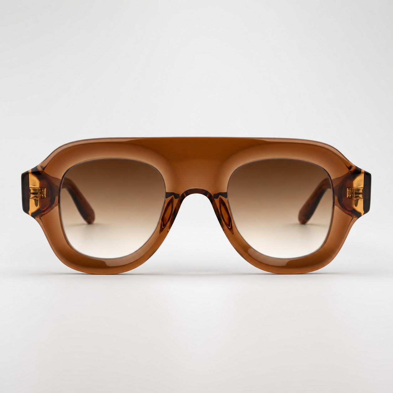 SOLARIS sunglasses in brown frame with gold hardware, studio front view