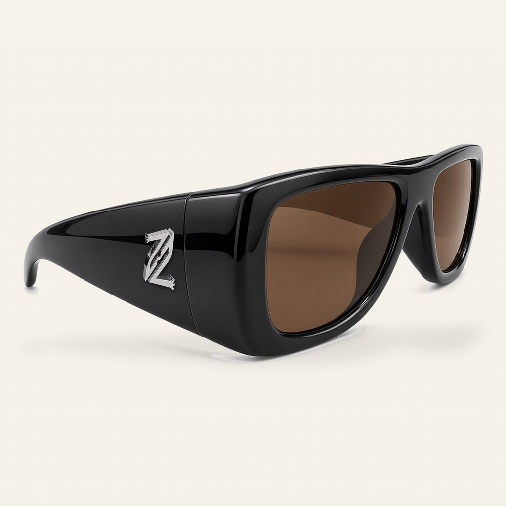 ZAYSHA BLOC sunglasses in Black / Brown, three-quarter angle view